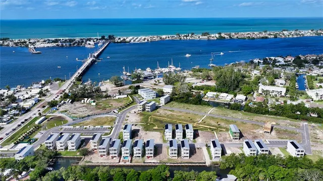 a view of a city with an ocean view