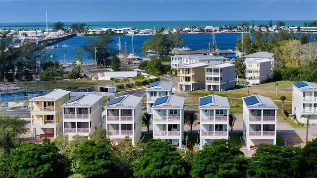a aerial view of multi story residential apartment building