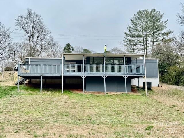 350 39th St Place Southwest Hickory, NC 28602 - Photo 17 of 19 a view of a house with a yard and roof roof