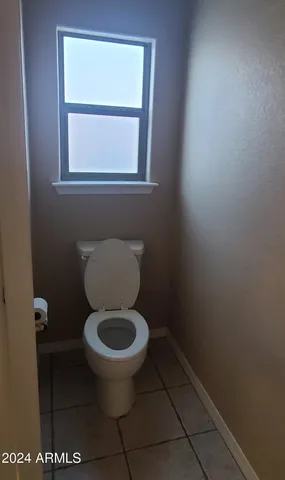 a bathroom with a toilet
