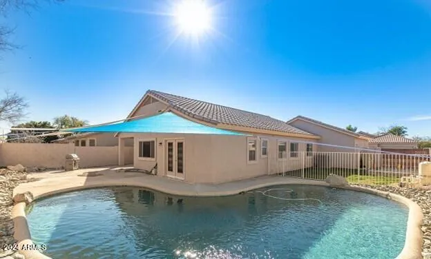 a view of a house with swimming pool
