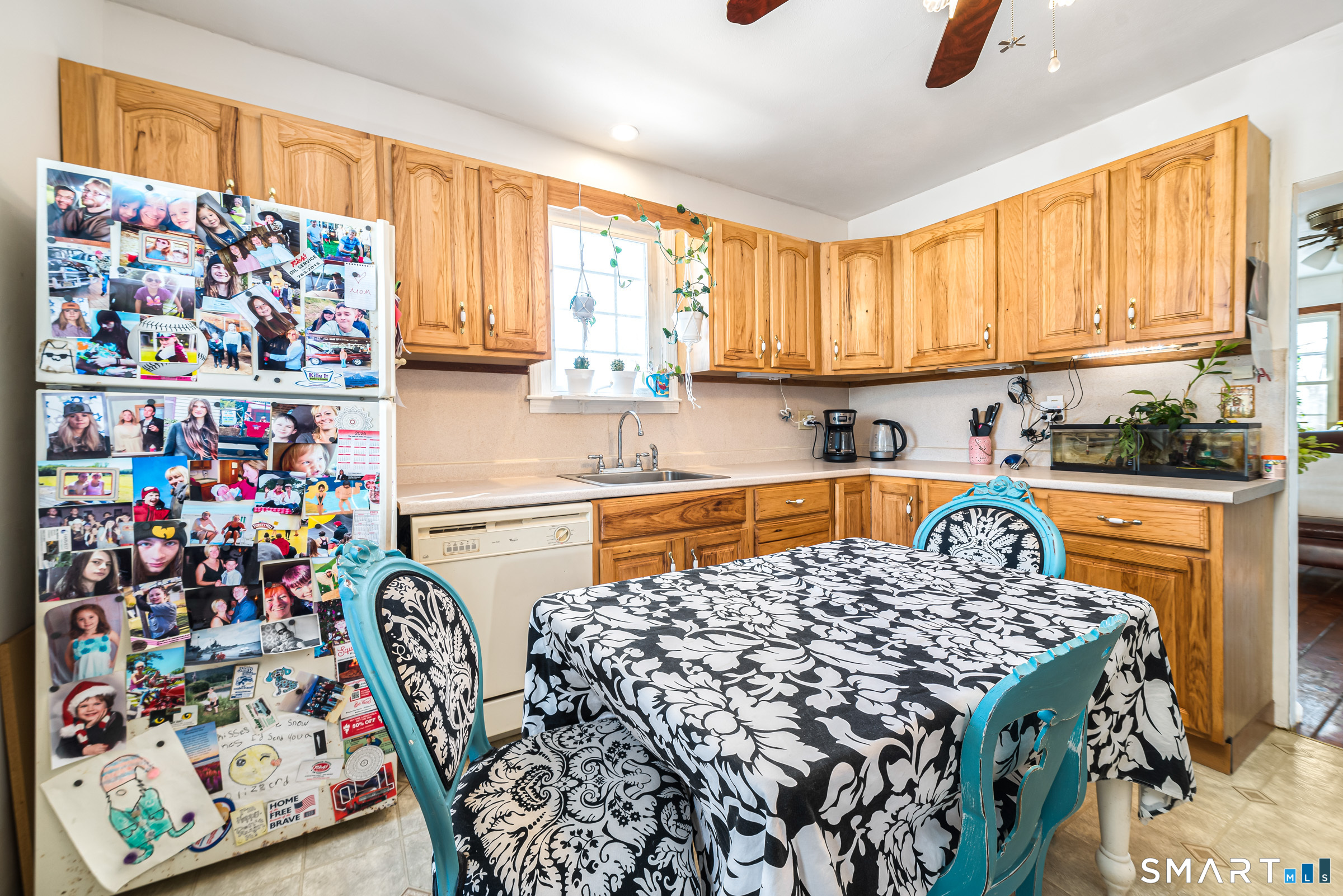11 Willard Avenue Enfield, CT 06082 - Photo 13 of 30 a kitchen with stainless steel appliances granite countertop a stove a sink and a refrigerator