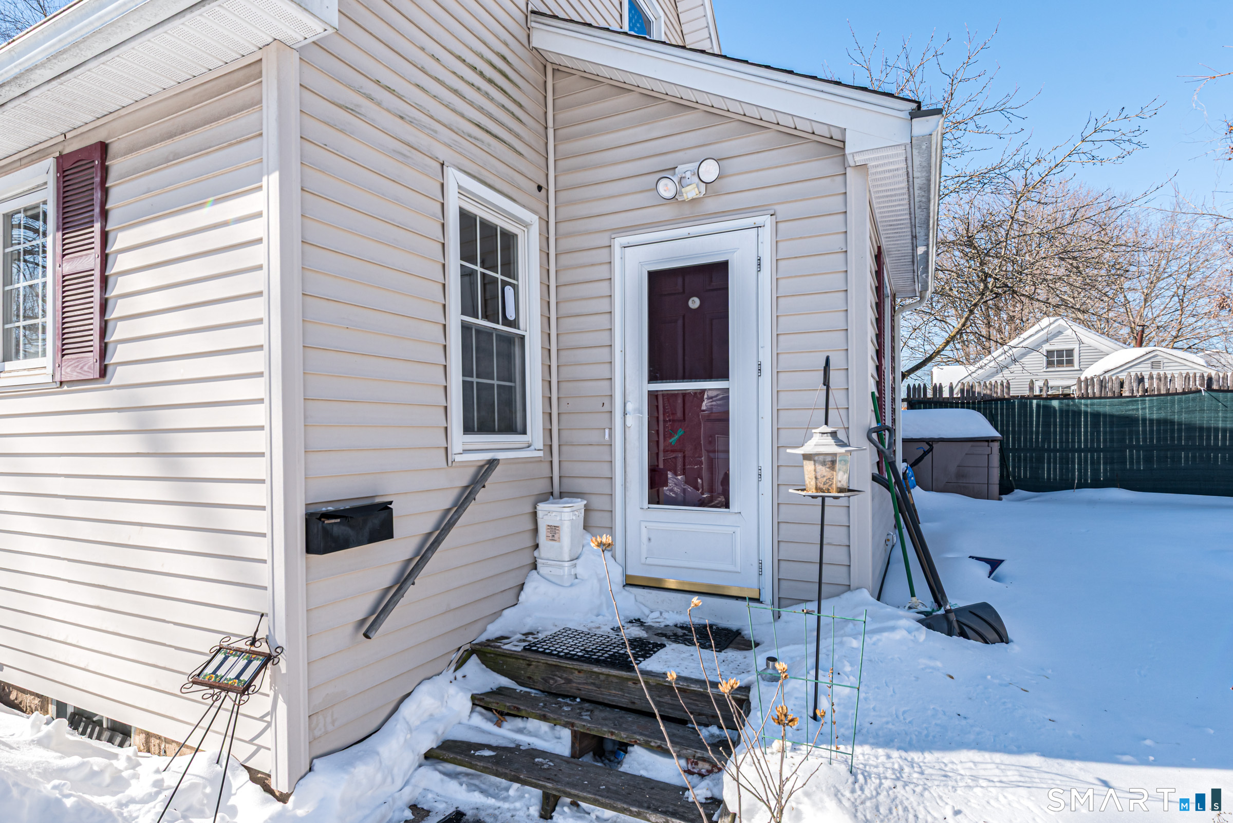 11 Willard Avenue Enfield, CT 06082 - Photo 25 of 30 a view of backyard with barbeque grill and wooden fence