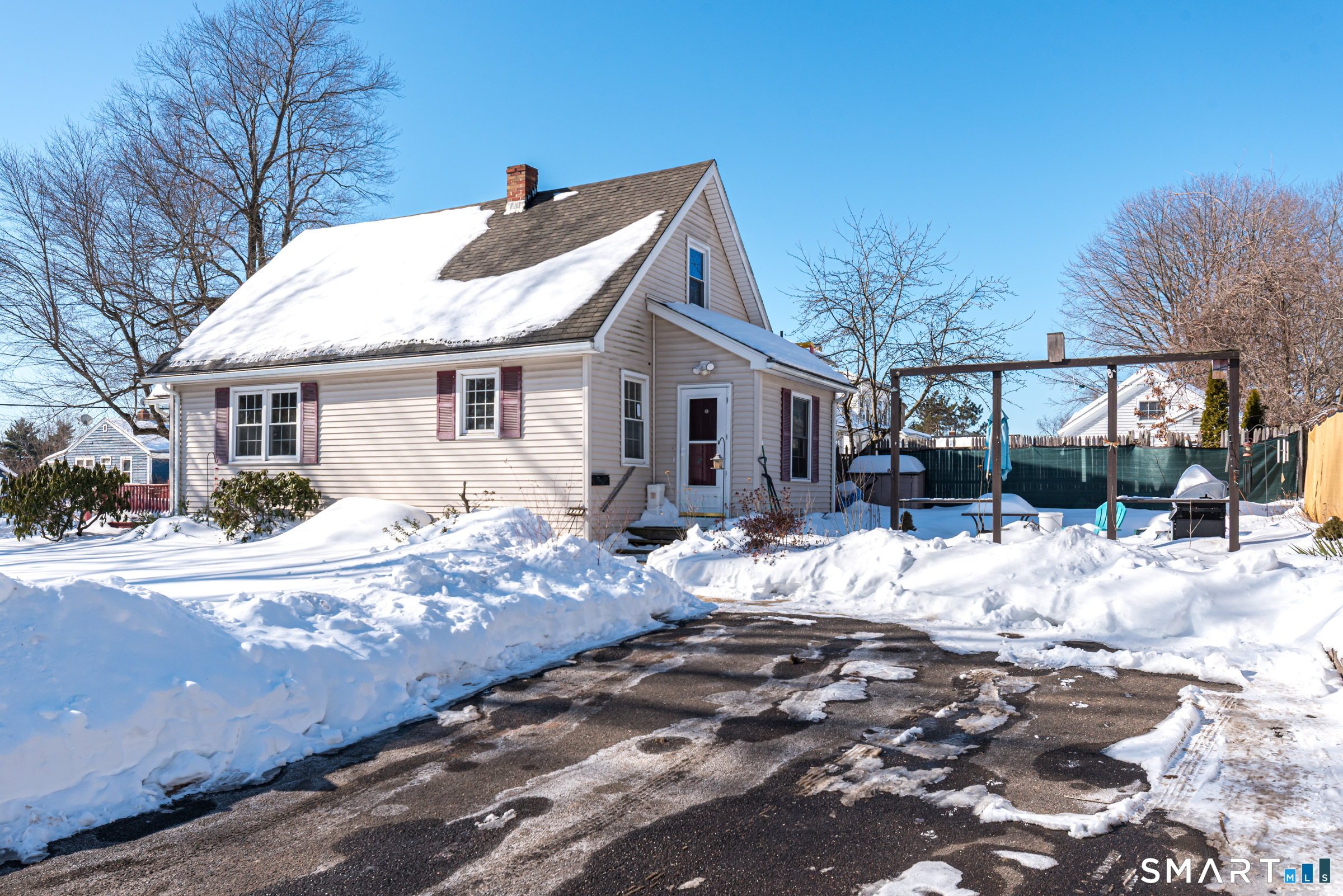 11 Willard Avenue Enfield, CT 06082 - Photo 27 of 30 a view of a house with a yard covered in snow