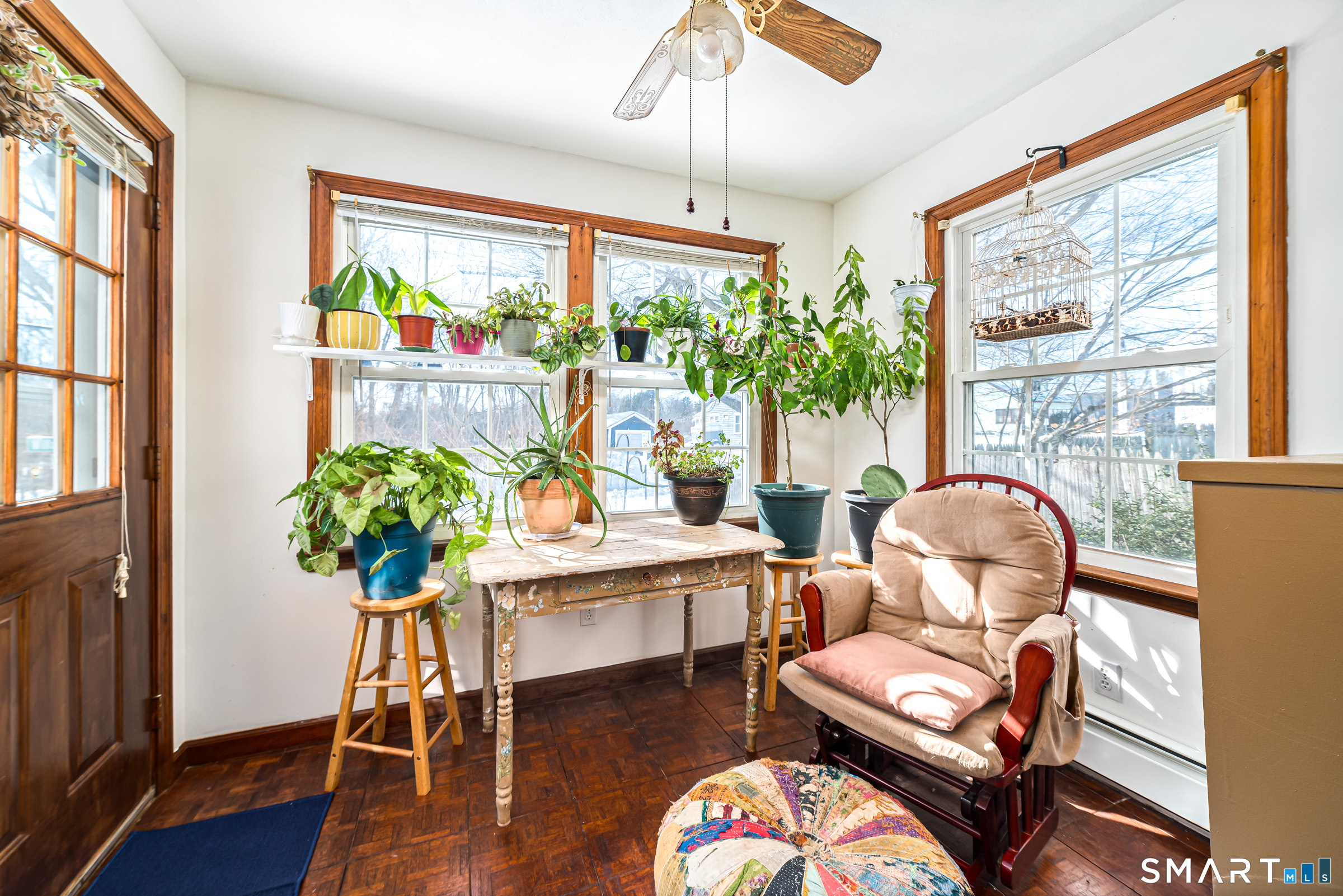 11 Willard Avenue Enfield, CT 06082 - Photo 7 of 30 a living room filled with furniture and a potted plant