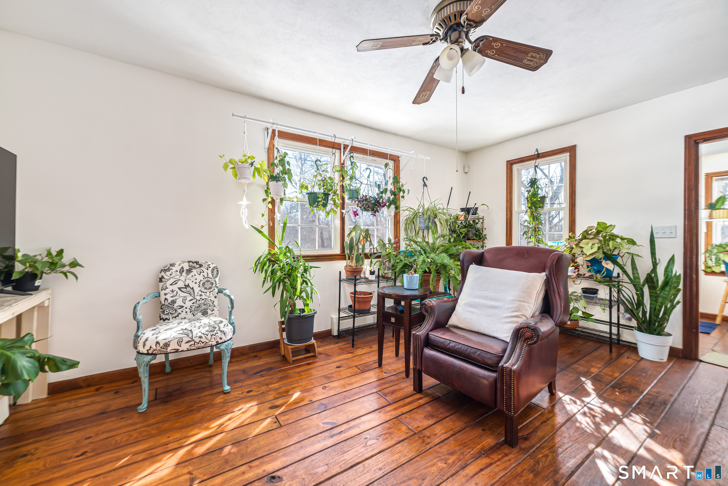 11 Willard Avenue Enfield, CT 06082 - Photo 10 of 30 a living room with furniture and a large window