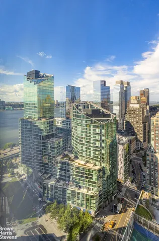 a view of a city with tall buildings