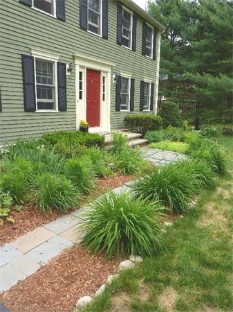 12 Nehemiah Road Shirley, MA 01464 - Photo 17 of 17 a front view of a house with yard and green space