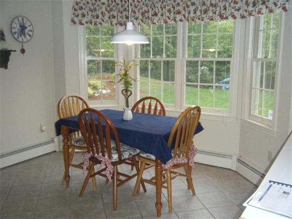 12 Nehemiah Road Shirley, MA 01464 - Photo 3 of 17 a view of a dining room with furniture window and outside view