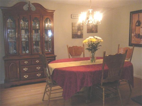 12 Nehemiah Road Shirley, MA 01464 - Photo 4 of 17 a bedroom with a bed and chandelier