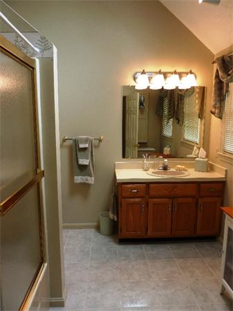 12 Nehemiah Road Shirley, MA 01464 - Photo 8 of 17 a bathroom with a double vanity sink and a mirror