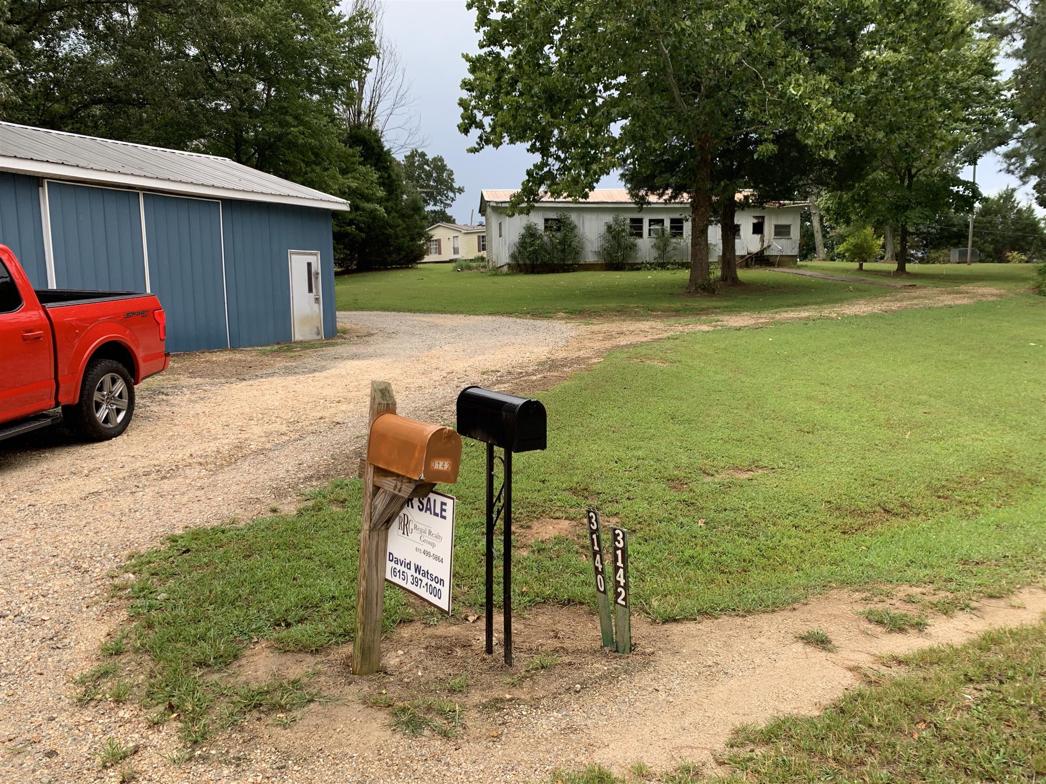 3142 Clifford Hicks Road Camden, TN 38320 - Photo 3 of 12 Entrance with shared drive way