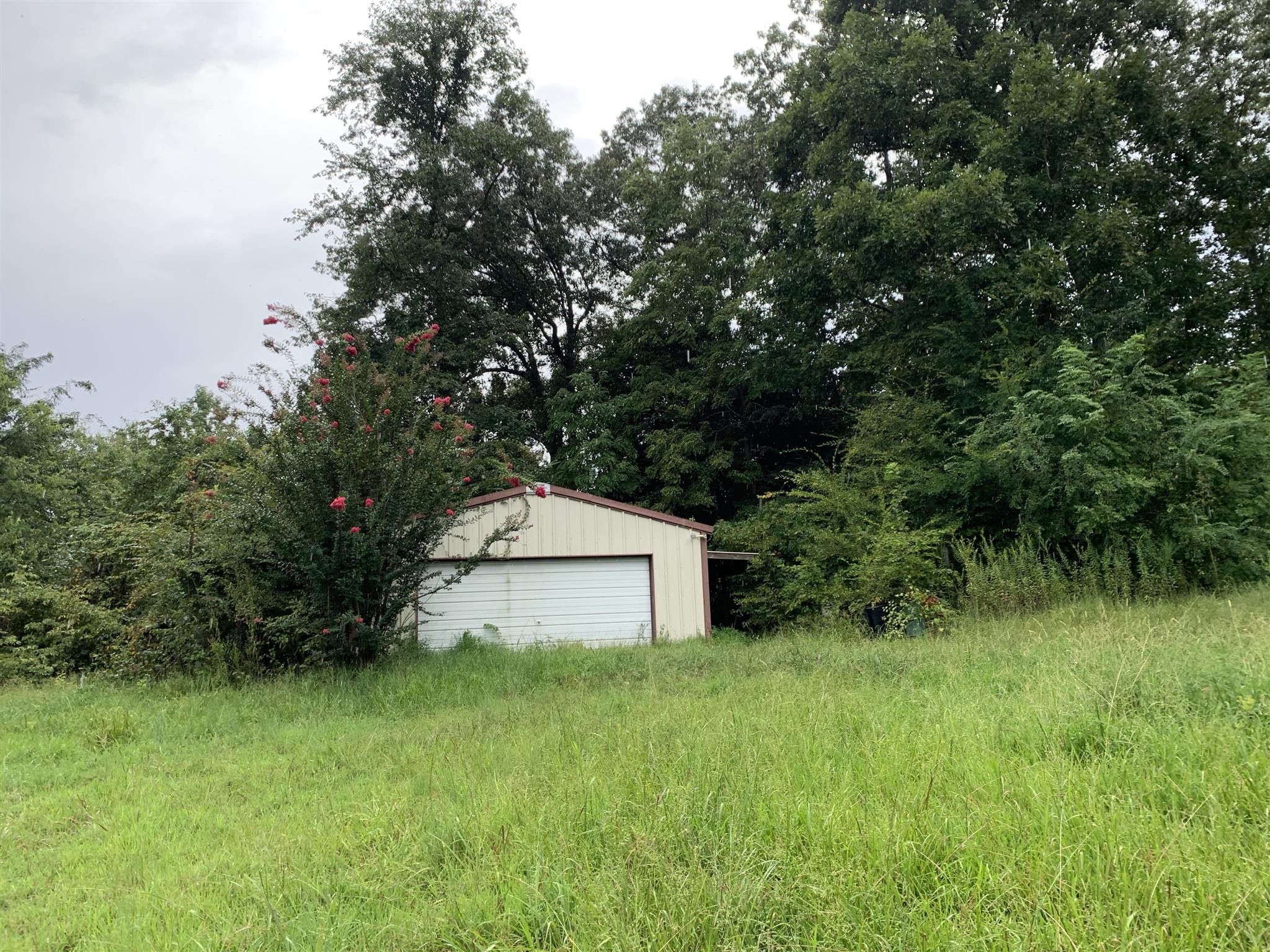3142 Clifford Hicks Road Camden, TN 38320 - Photo 6 of 12 Storage shed