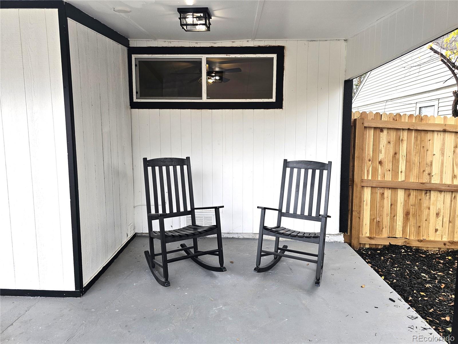 124 South Grove Street Denver, CO 80219 - Photo 15 of 25 a view of staircase with furniture and window