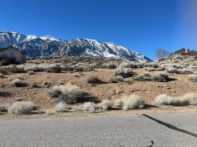 a view of a road with a mountain view in back