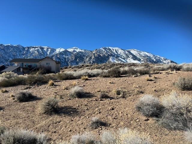 4811 Sherwin Trail Bishop, CA 93514 - Photo 4 of 6 a view of a dry field with mountains in the background