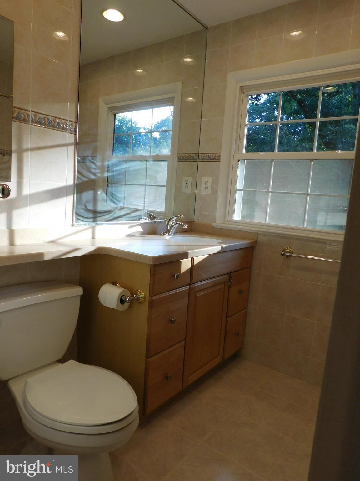 2404 Old Trace Lane Reston, VA 20191 - Photo 18 of 30 Tiled Hall Bath