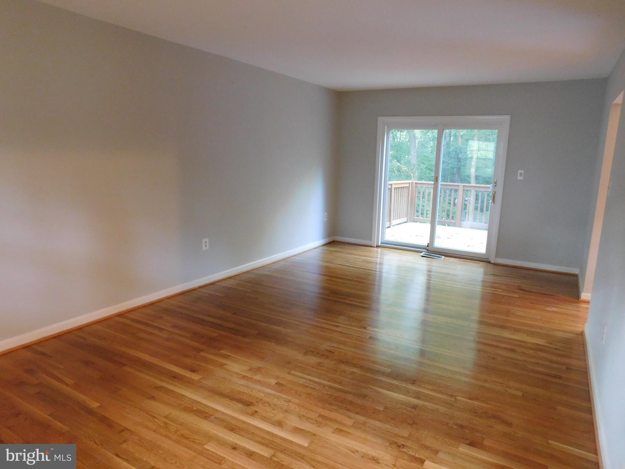 2404 Old Trace Lane Reston, VA 20191 - Photo 10 of 30 Generous Living Room opens to Deck