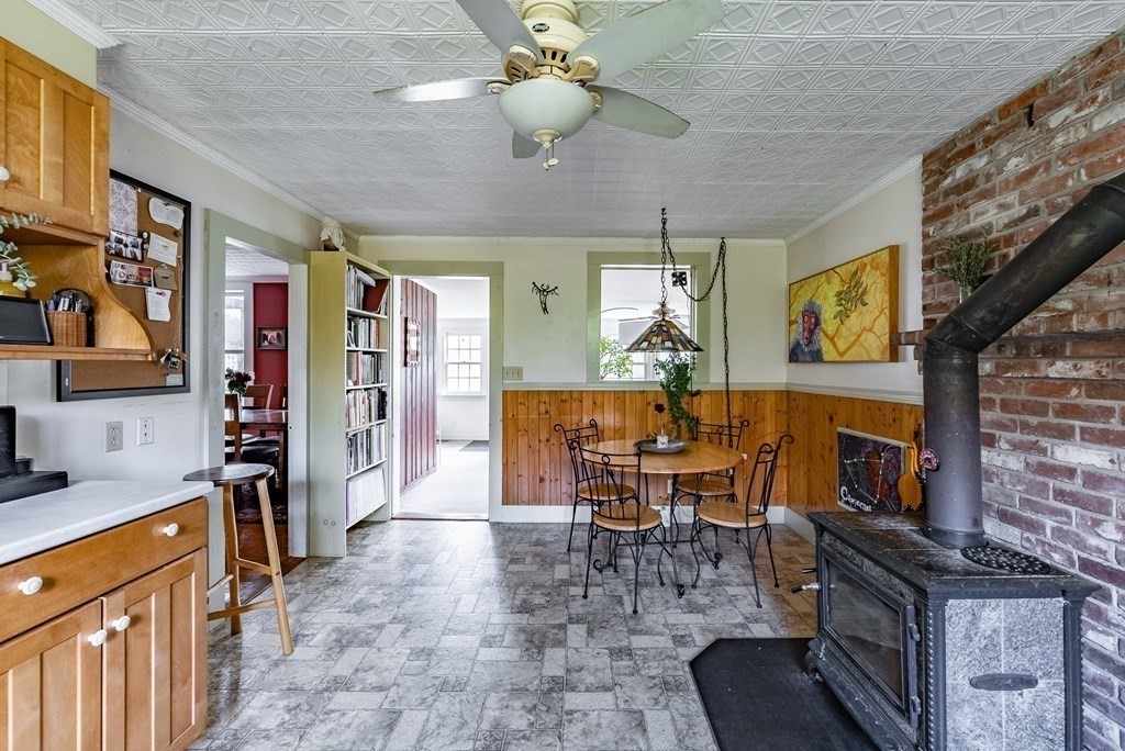 65 Old Bay Road Belchertown, MA 01007 - Photo 13 of 42 a view of a dining room with furniture a chandelier and window
