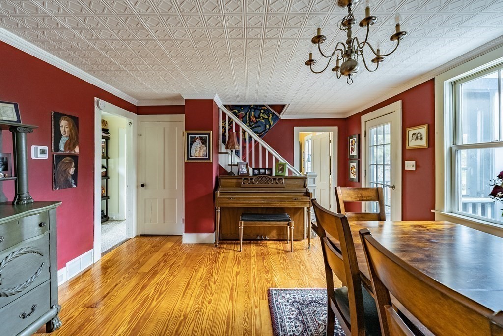 65 Old Bay Road Belchertown, MA 01007 - Photo 16 of 42 a view of a livingroom with furniture staircase and wooden floor