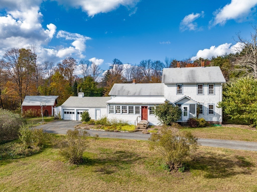 65 Old Bay Road Belchertown, MA 01007 - Photo 2 of 42 a front view of a house with a yard