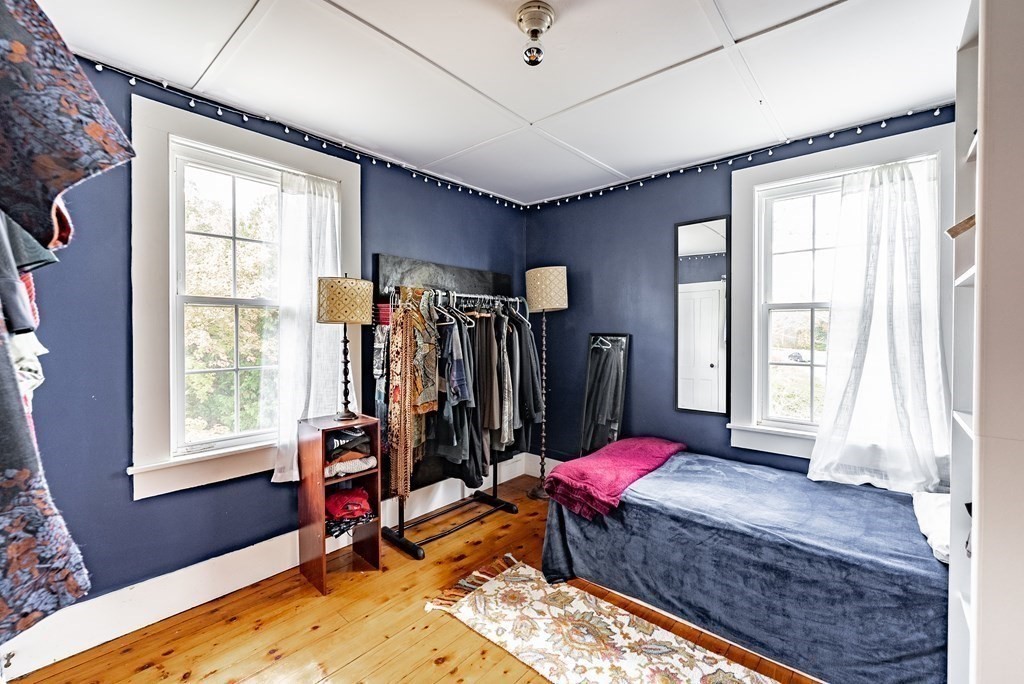 65 Old Bay Road Belchertown, MA 01007 - Photo 26 of 42 a bed room with a bed and a window