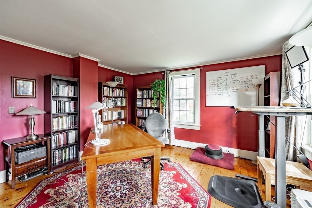 65 Old Bay Road Belchertown, MA 01007 - Photo 29 of 42 a bed room with a bed and a book shelf