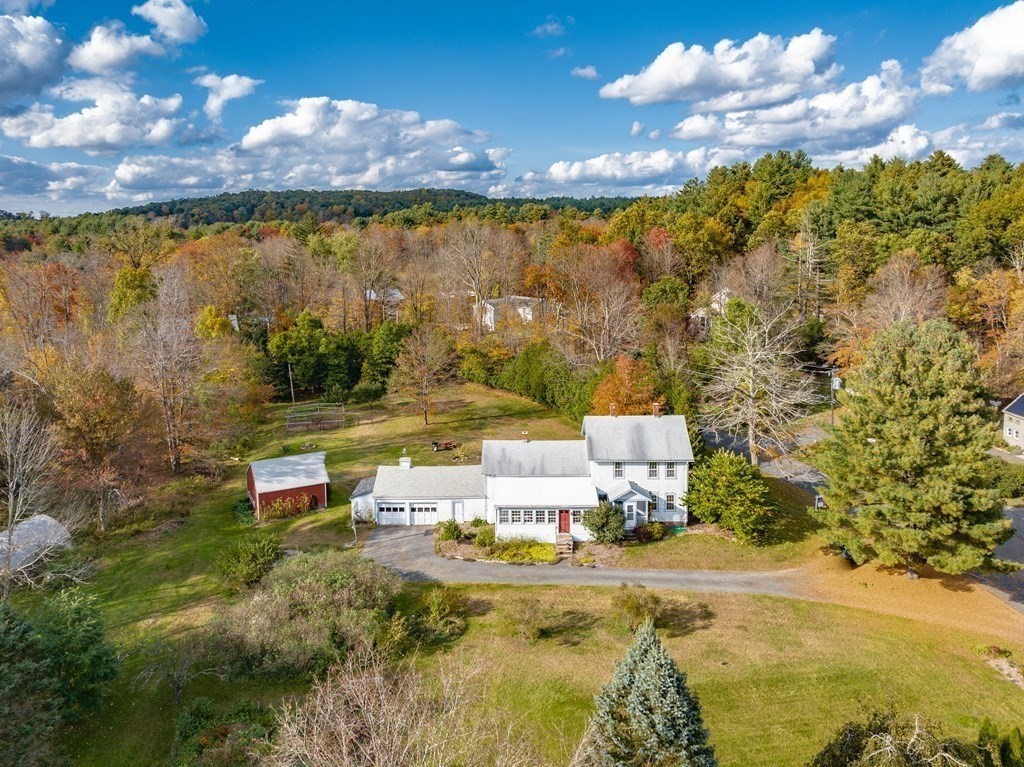 65 Old Bay Road Belchertown, MA 01007 - Photo 3 of 42 a view of a lake with a big yard