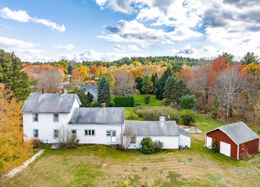 65 Old Bay Road Belchertown, MA 01007 - Photo 35 of 42 an aerial view of a house with a garden and lake view
