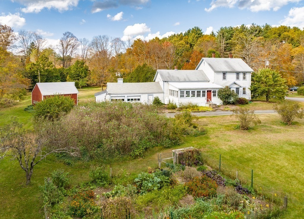 65 Old Bay Road Belchertown, MA 01007 - Photo 36 of 42 an aerial view of a house with a yard basket ball court and outdoor seating