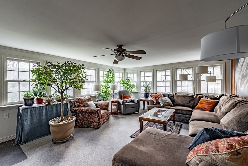 65 Old Bay Road Belchertown, MA 01007 - Photo 6 of 42 a living room with furniture and a large window