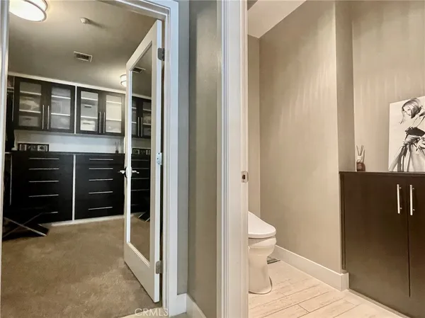 a bathroom with a toilet and a sink