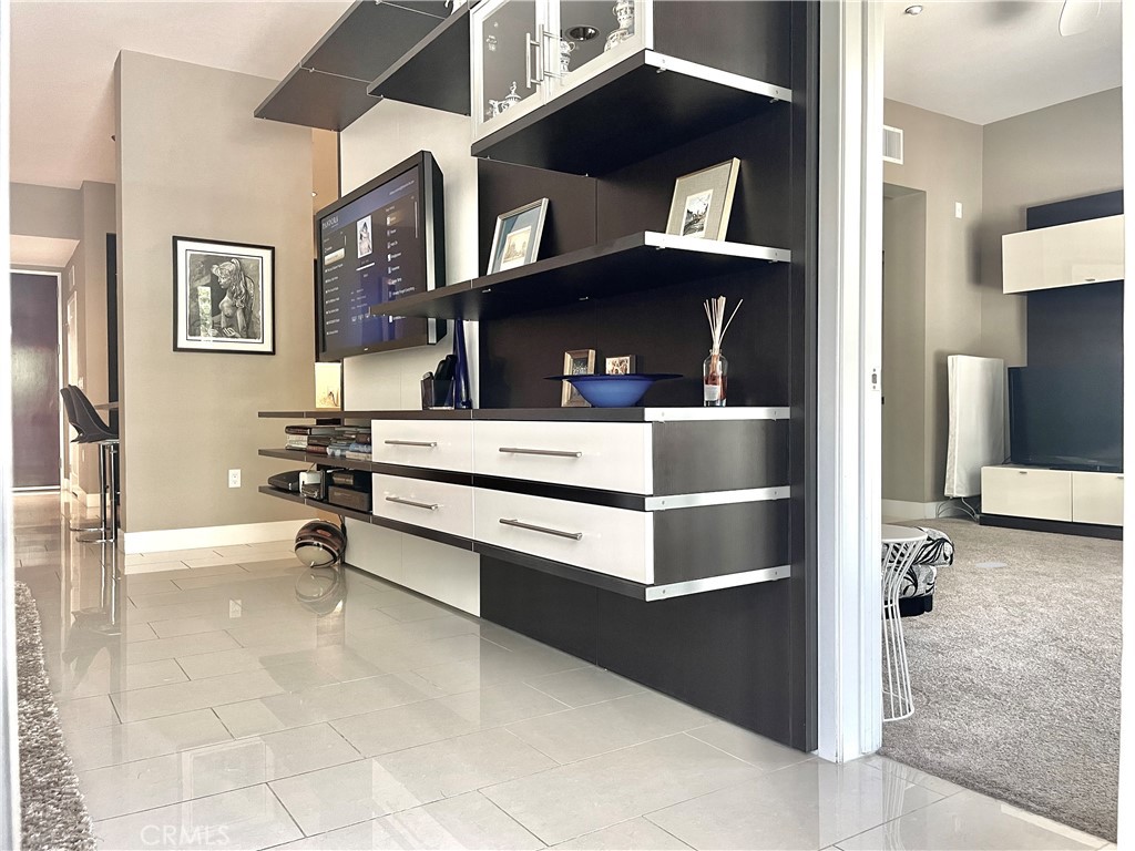 402 Rockefeller, Unit 118 Irvine, CA 92612 - Photo 14 of 24 a view of living room with furniture and a ceiling fan