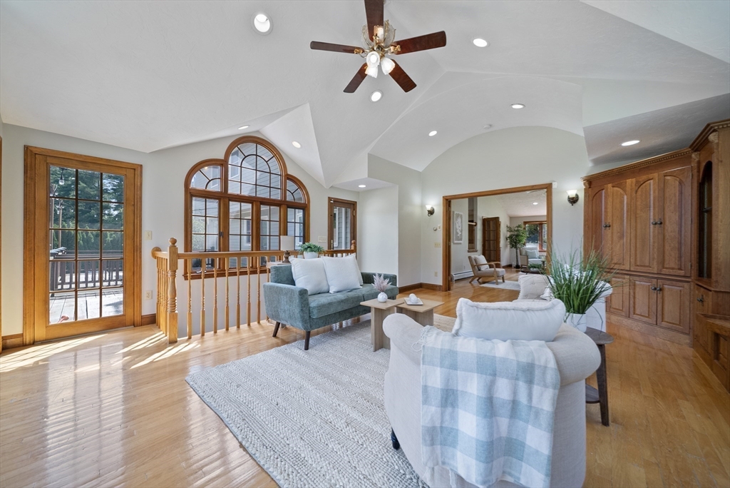 21 Cranberry Road Pepperell, MA 01463 - Photo 16 of 41 a living room with furniture fireplace and a large window