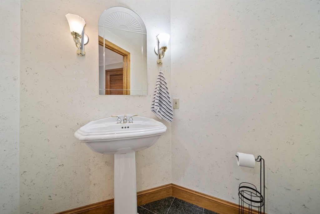 21 Cranberry Road Pepperell, MA 01463 - Photo 21 of 41 a bathroom with a sink and a mirror