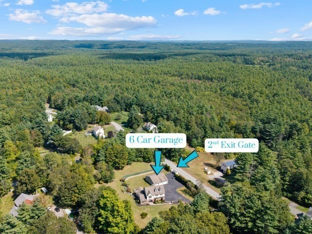 21 Cranberry Road Pepperell, MA 01463 - Photo 36 of 41 a view of a lake with a house