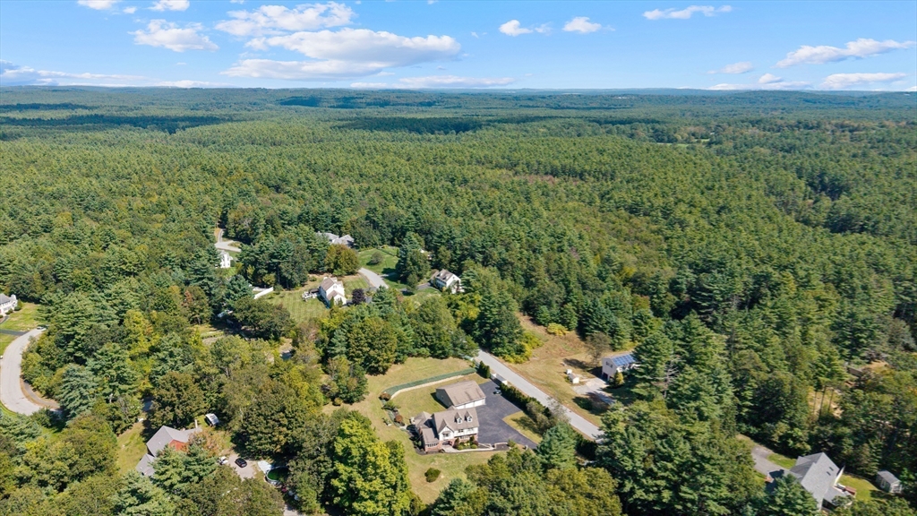 21 Cranberry Road Pepperell, MA 01463 - Photo 37 of 41 an aerial view of residential houses with outdoor space and trees