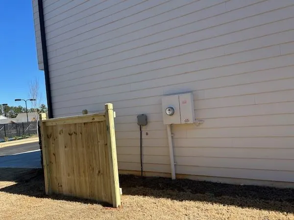 a kitchen with a refrigerator and a stove