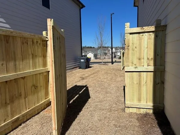 a view of a room with wooden walls
