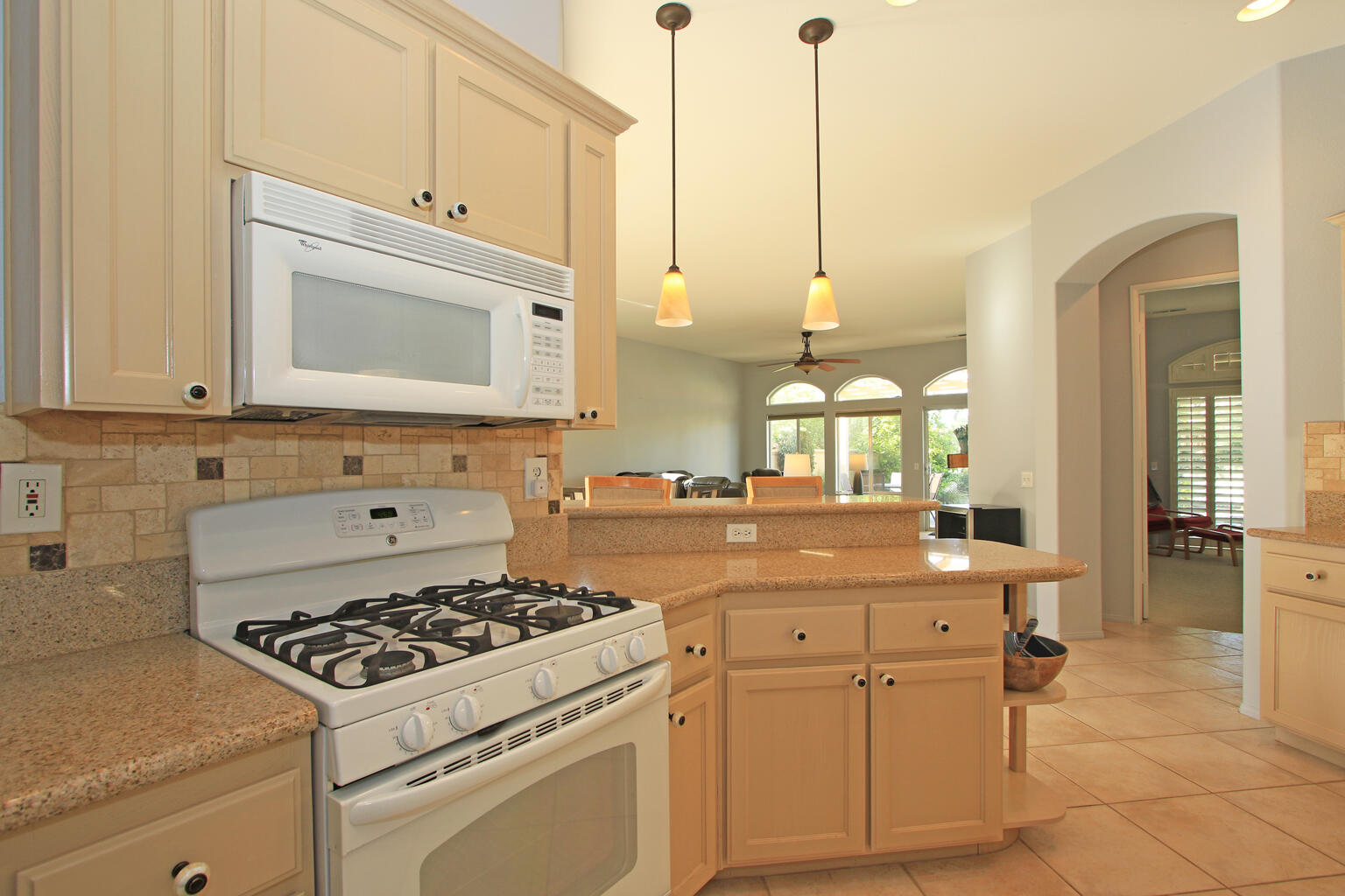 82652 Sky View Lane Indio, CA 92201 - Photo 11 of 44 a kitchen with appliances cabinets and furniture