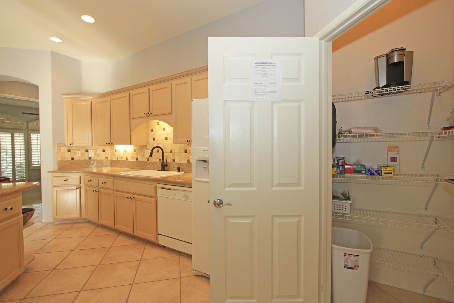 82652 Sky View Lane Indio, CA 92201 - Photo 13 of 44 a bathroom with a granite countertop sink a mirror and a shower
