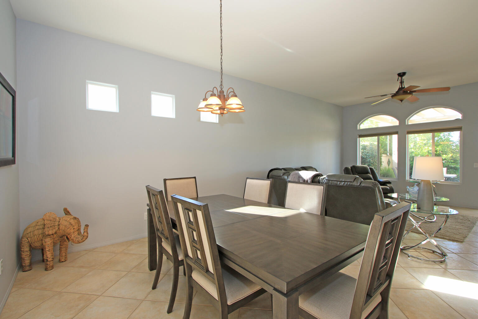 82652 Sky View Lane Indio, CA 92201 - Photo 18 of 44 a view of a dining room with furniture and chandelier