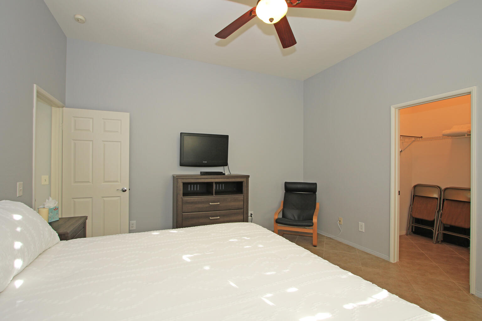 82652 Sky View Lane Indio, CA 92201 - Photo 29 of 44 a bedroom with a bed and a television