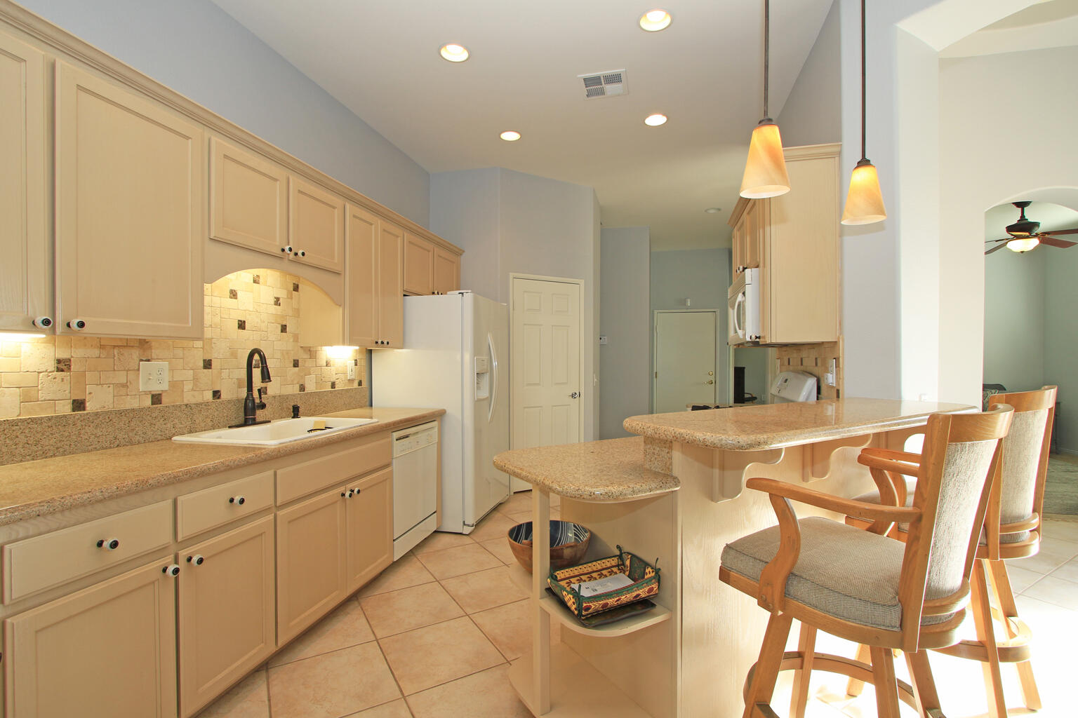 82652 Sky View Lane Indio, CA 92201 - Photo 3 of 44 a bathroom with a sink a mirror and a shower