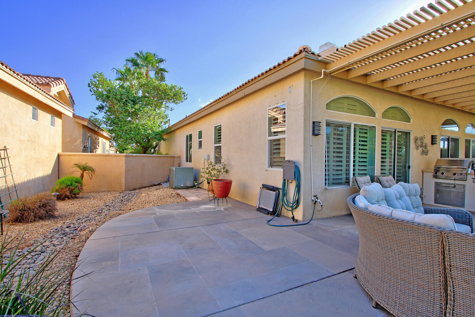 82652 Sky View Lane Indio, CA 92201 - Photo 37 of 44 a view of a house with backyard and sitting area