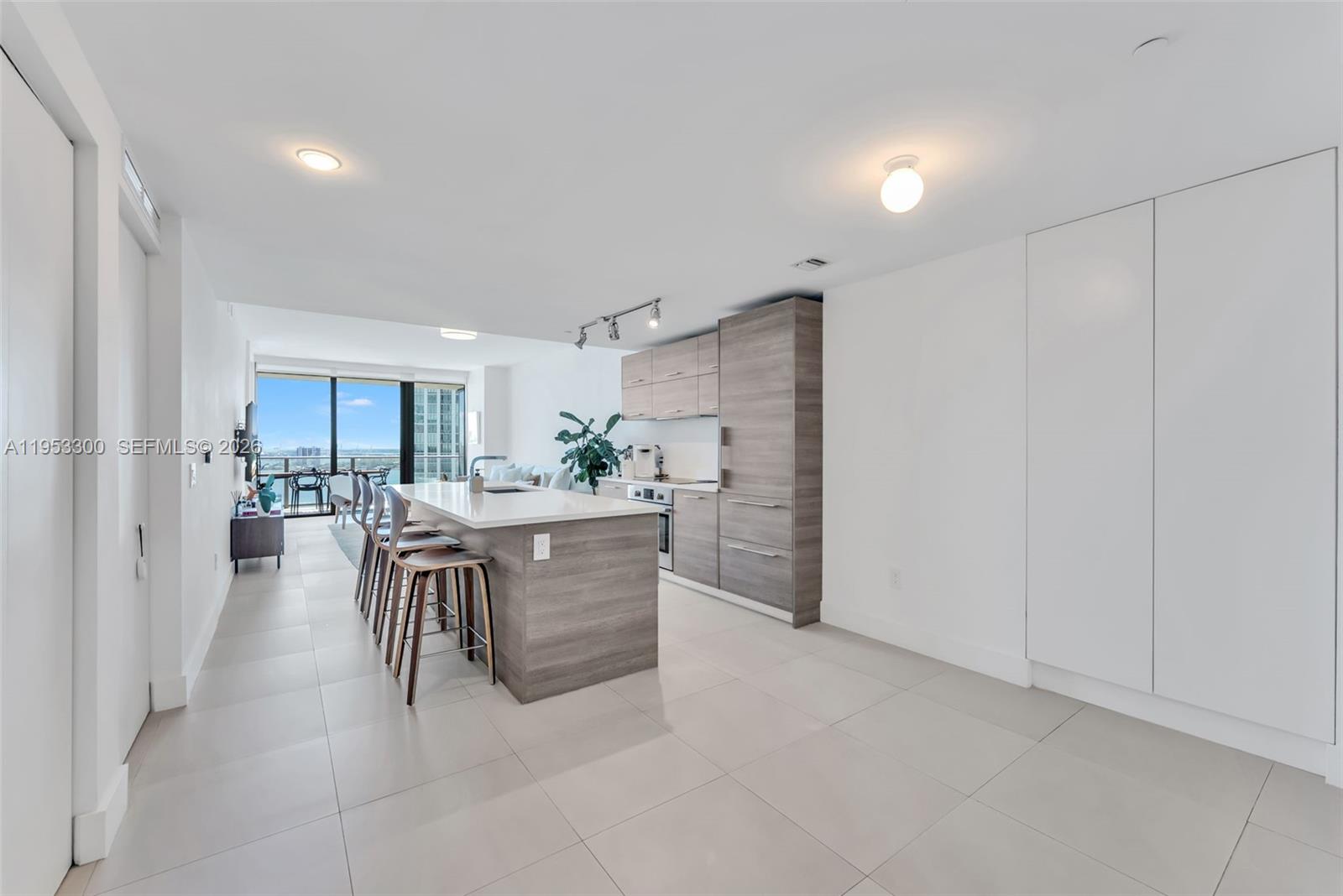 650 Northeast 32nd Street, Unit 2703 Miami, FL 33137 - Photo 16 of 51 a view of a kitchen and dining room