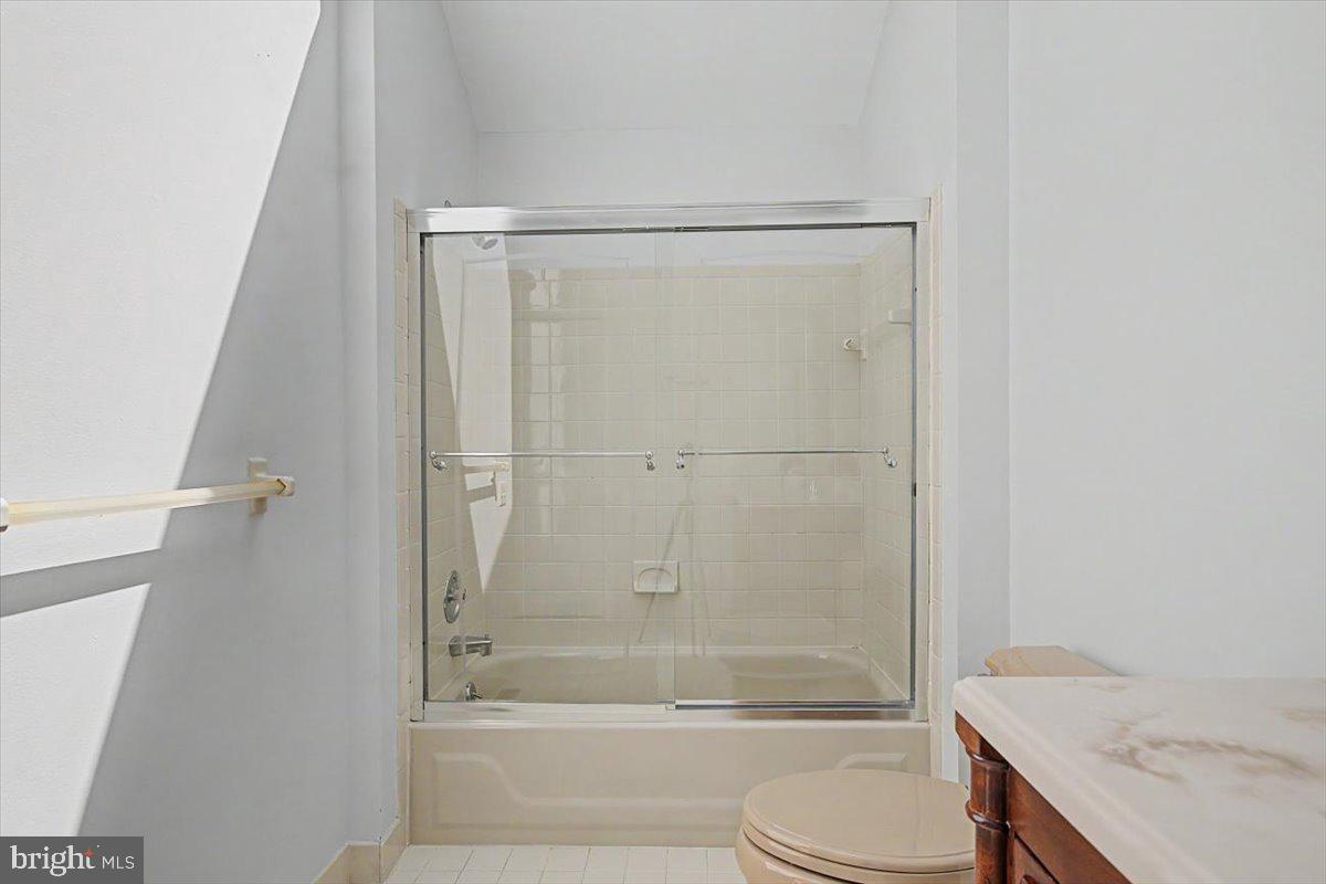5 Steeplechase Road Wilmington, DE 19808 - Photo 24 of 39 a bathroom with a granite countertop bathtub shower sink vanity and toilet