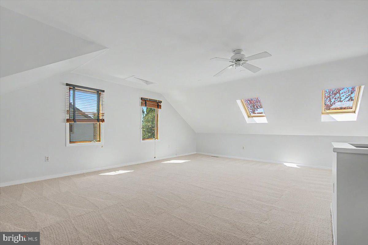 5 Steeplechase Road Wilmington, DE 19808 - Photo 25 of 39 an empty room with windows and fan