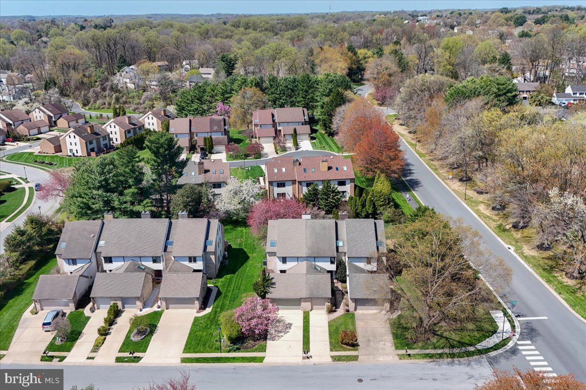 5 Steeplechase Road Wilmington, DE 19808 - Photo 33 of 39 an aerial view of multiple houses with yard