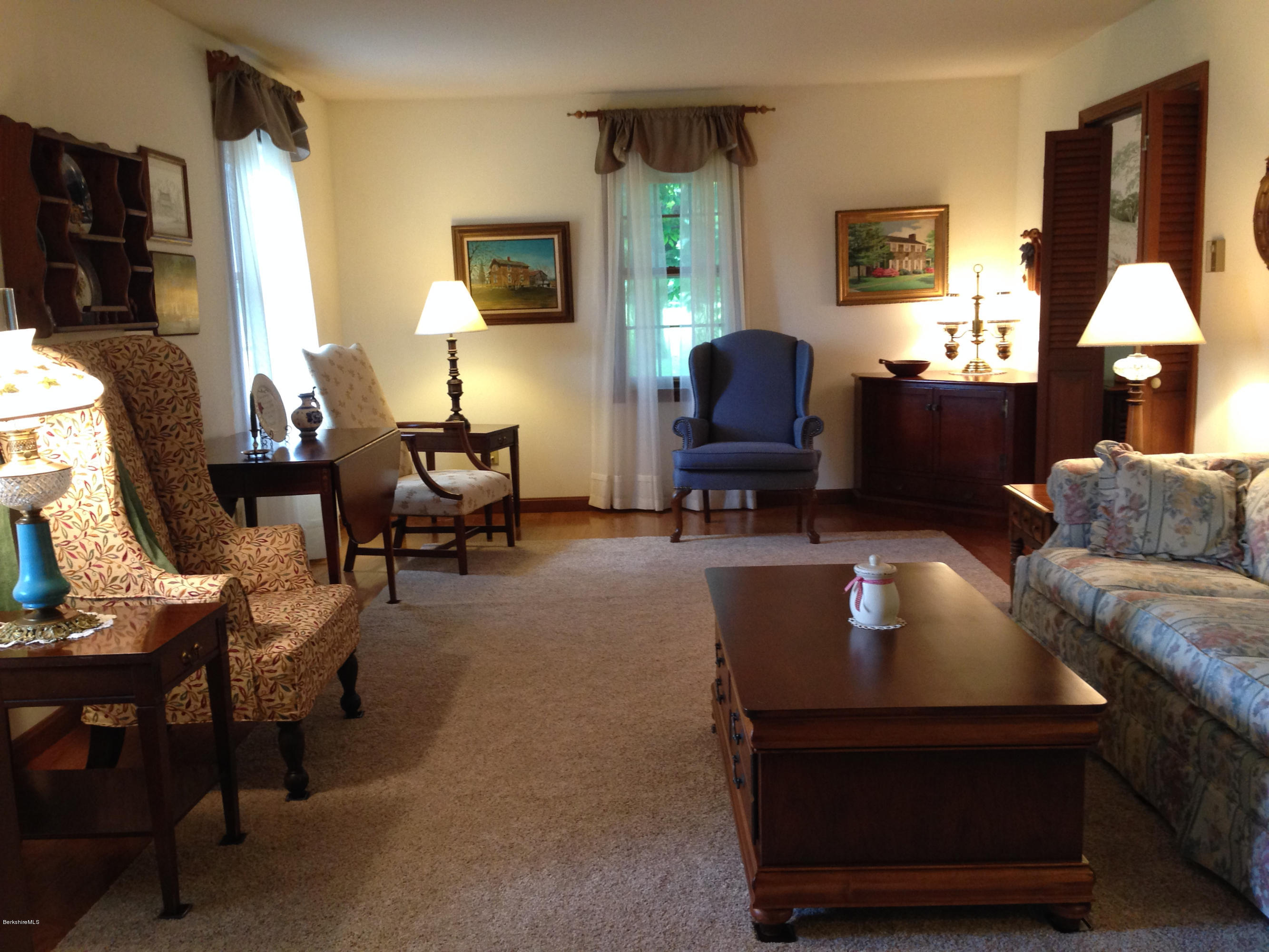 151 Old Post Road Richmond, MA 01201 - Photo 2 of 39 a living room with furniture a window and a fireplace